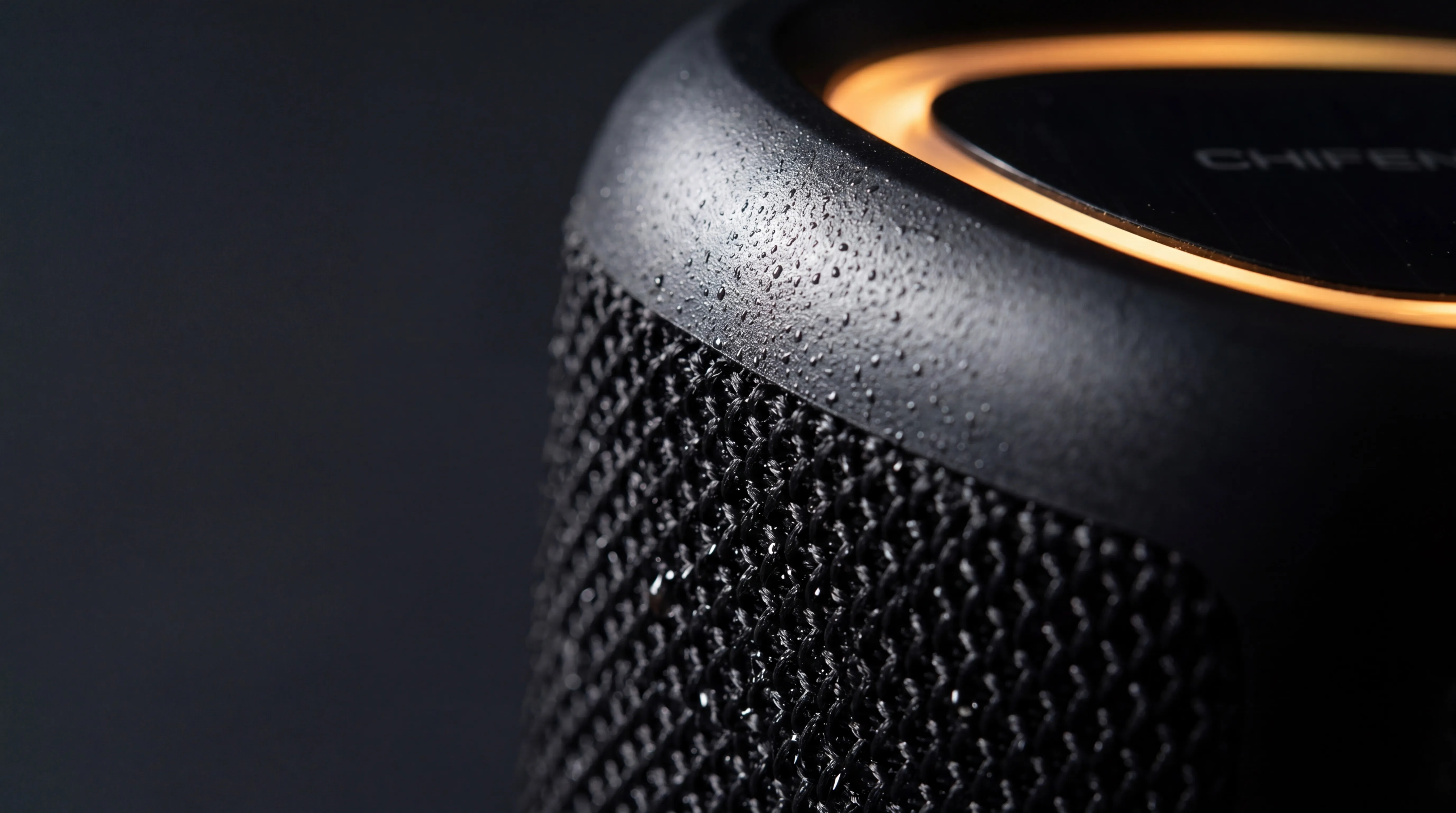 CHIFENCHY speaker close-up showing honeycomb-hex grille and passive radiator